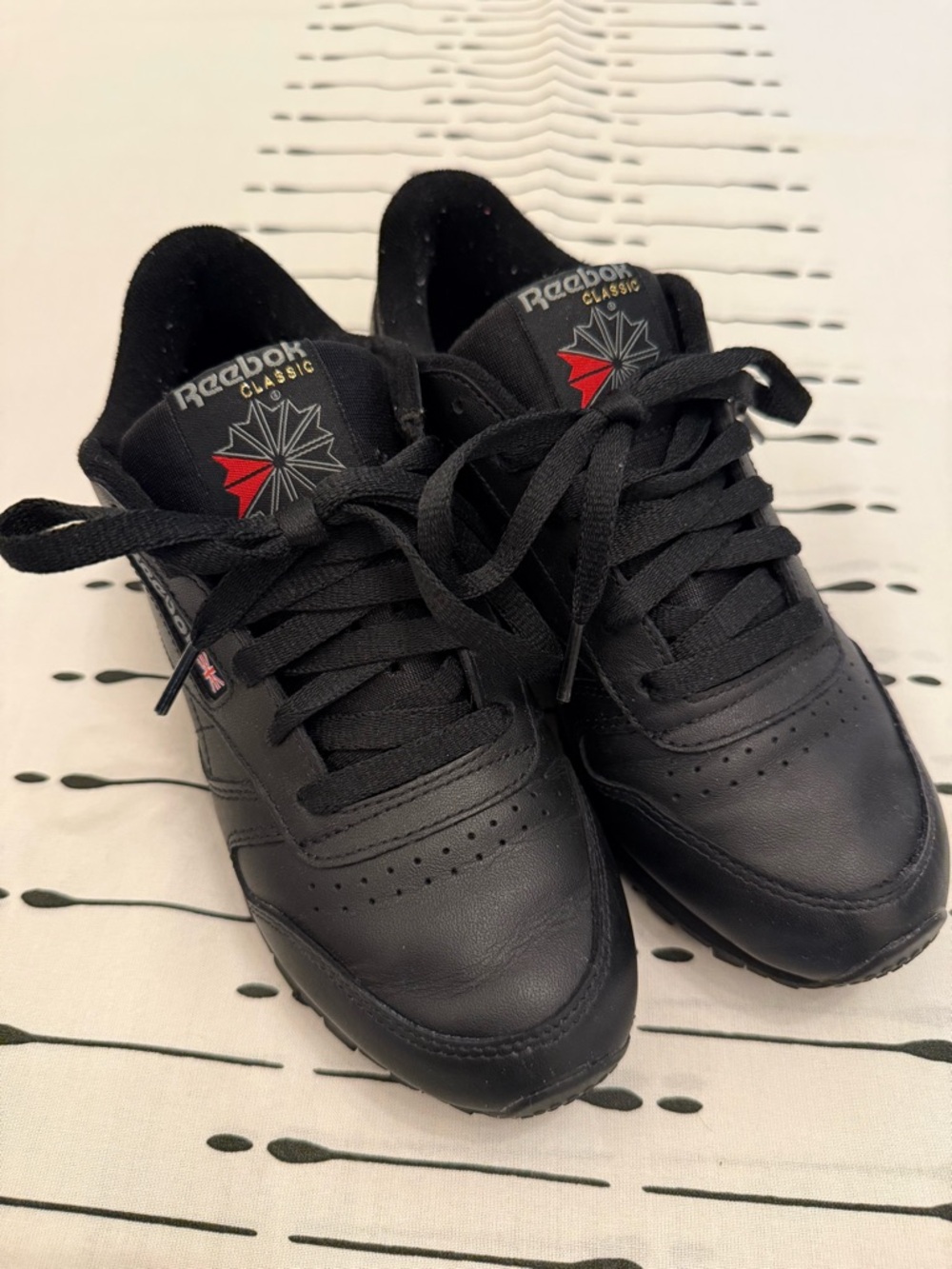 Reebok Black Leather Classic Low-Top Sneakers with Red Logo Accent